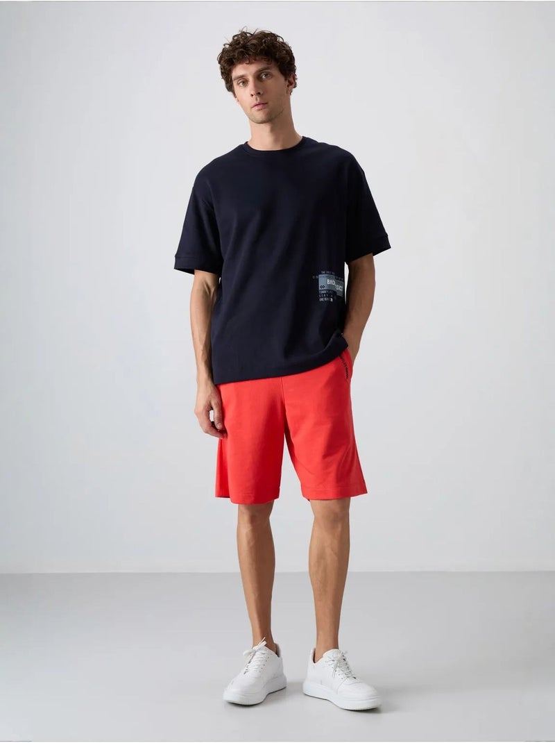 Short homme en mélange coton tommy Orange - Kiabi