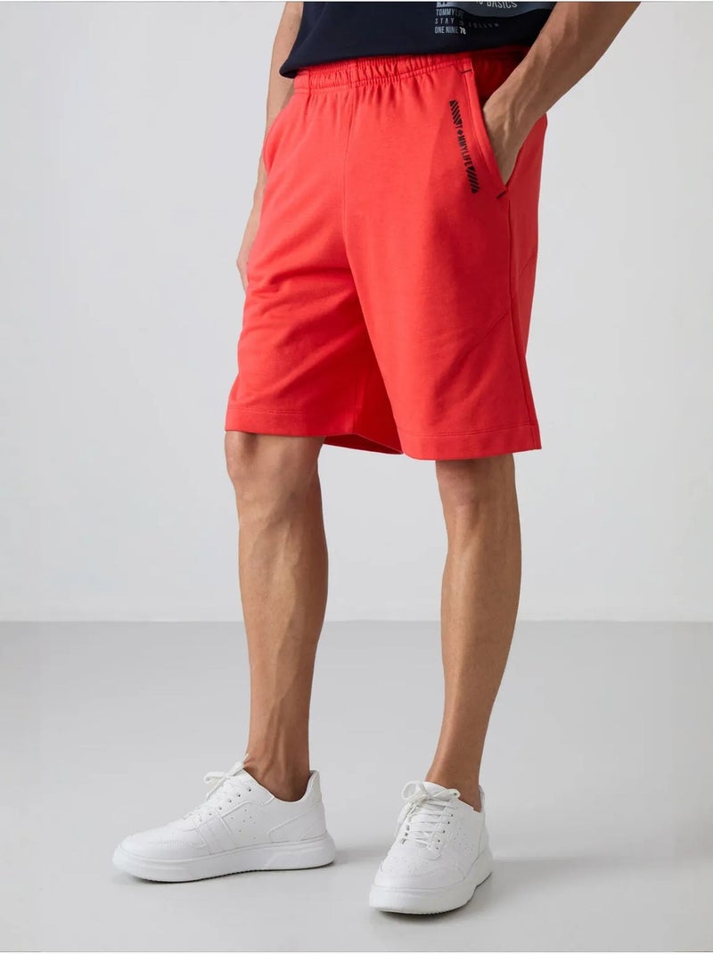 Short homme en mélange coton tommy Orange - Kiabi