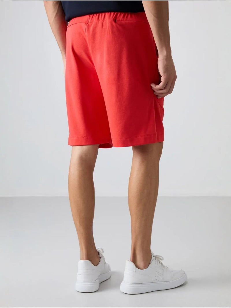 Short homme en mélange coton tommy Orange - Kiabi