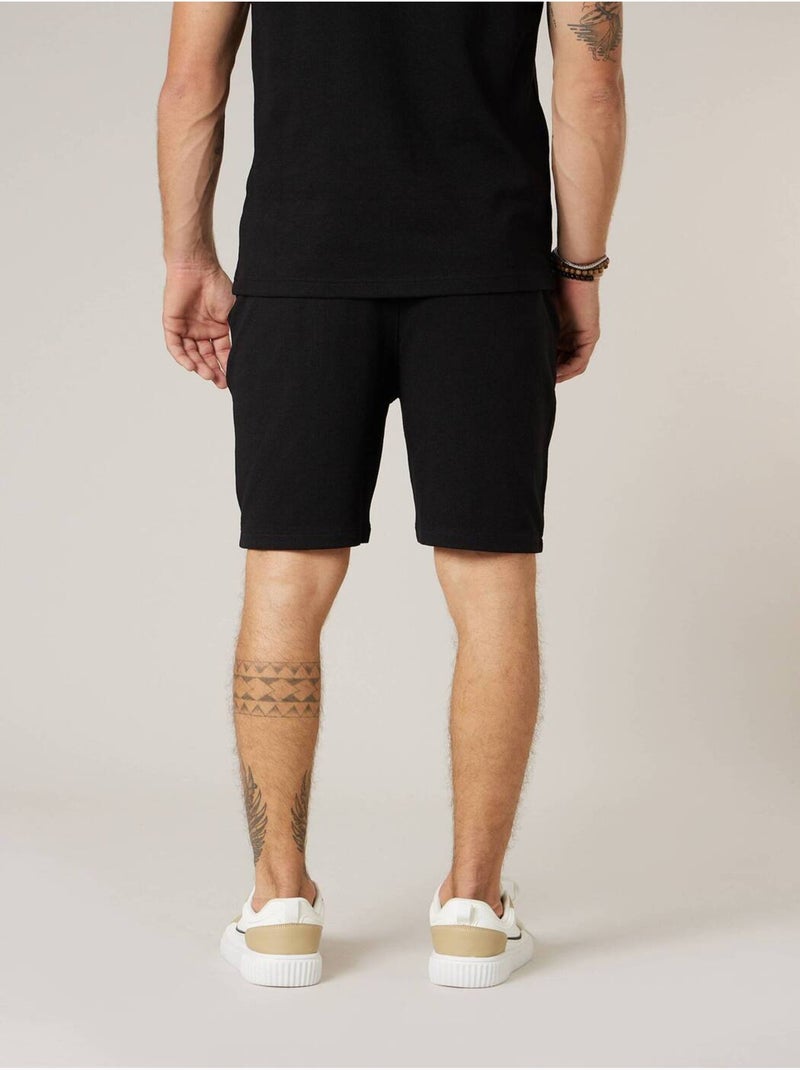 Short jogger homme en coton 'Deeluxe' Noir - Kiabi