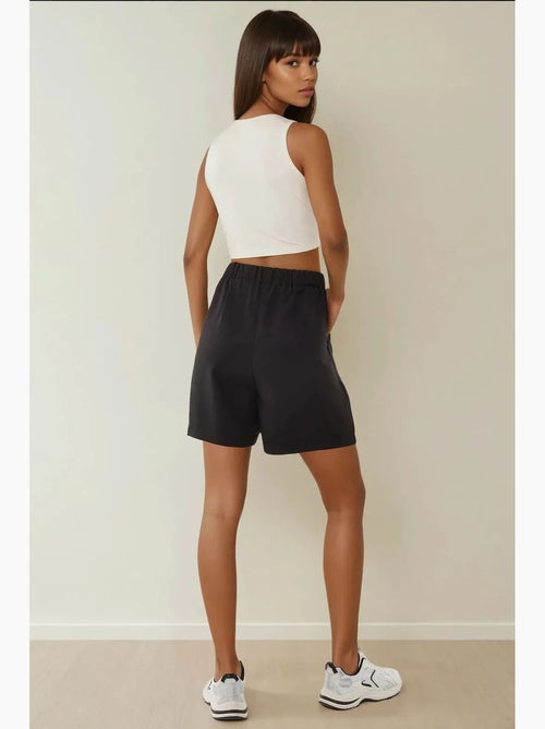 Short taille haute plissé en lyocell doux au toucher hiccup - Kiabi Short taille haute plissé en lyocell doux au toucher hiccup - Kiabi