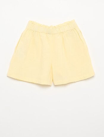 Short uni avec nœud fantaisie