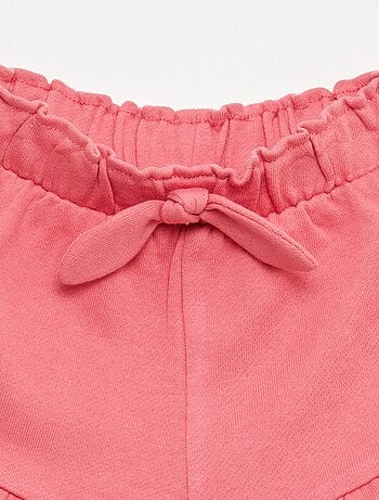 Short volanté avec nœud à la taille