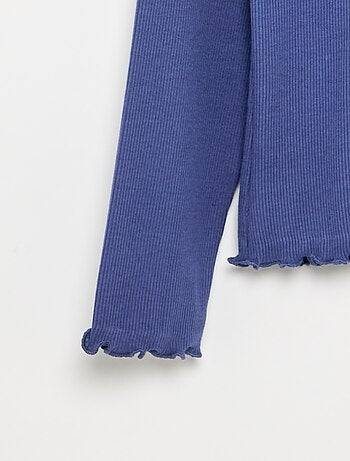 Sous-pull uni avec finitions ondulées
