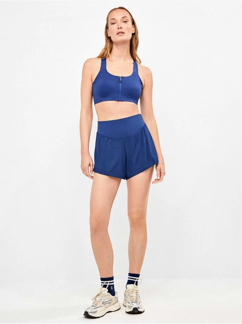 Soutien-gorge de sport à haute maintien avec fermeture éclair à l'avant - Kiabi Soutien-gorge de sport à haute maintien avec fermeture éclair à l'avant - Kiabi