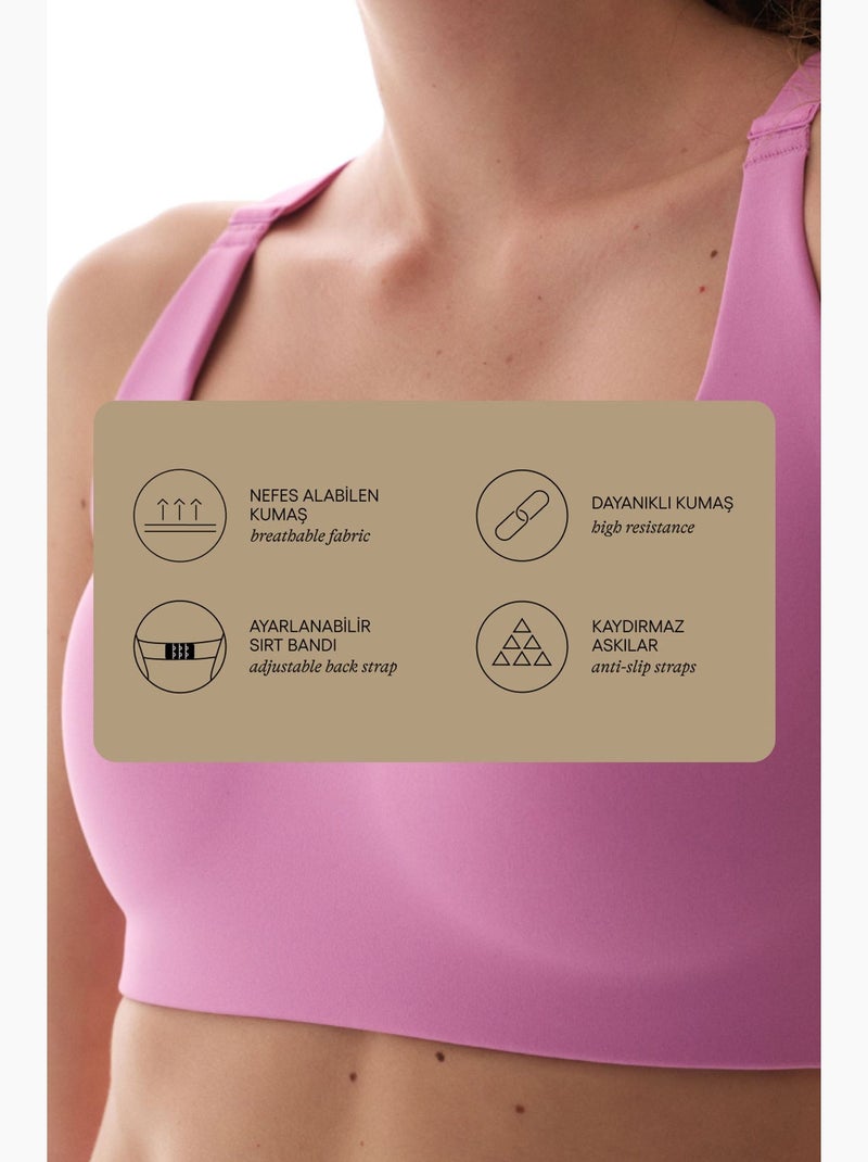 Soutien-gorge de sport dos croisé, maintien moyen, bretelles antidérapantes penti Magenta - Kiabi