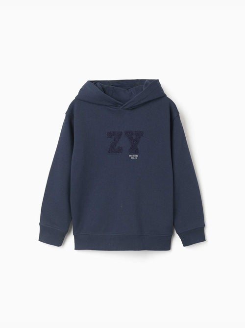 Sweat à capuche avec broderie en bouclettes zy - Kiabi Sweat à capuche avec broderie en bouclettes zy - Kiabi