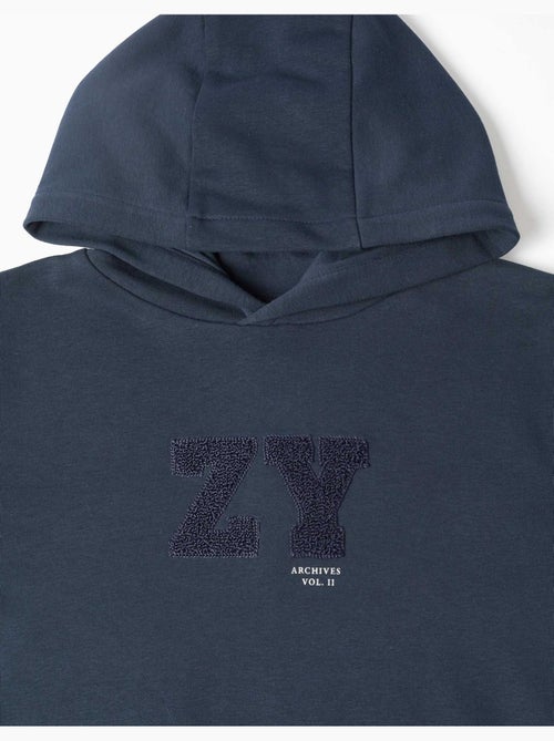 Sweat à capuche avec broderie en bouclettes zy - Kiabi Sweat à capuche avec broderie en bouclettes zy - Kiabi