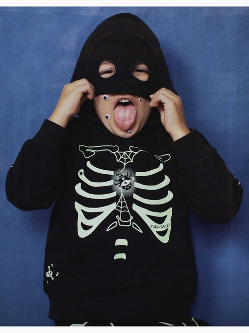 Sweat à capuche avec imprimé qui brille dans le noir - Kiabi Sweat à capuche avec imprimé qui brille dans le noir - Kiabi