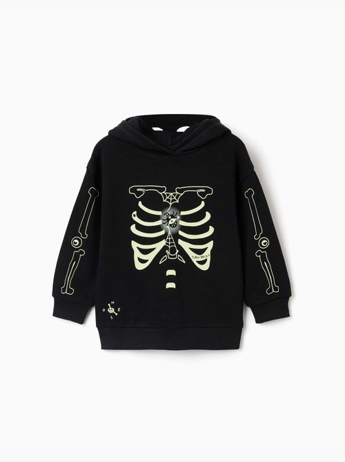 Sweat à capuche avec imprimé qui brille dans le noir - Kiabi Sweat à capuche avec imprimé qui brille dans le noir - Kiabi