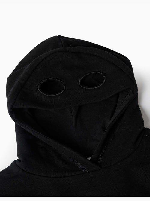 Sweat à capuche avec imprimé qui brille dans le noir - Kiabi Sweat à capuche avec imprimé qui brille dans le noir - Kiabi