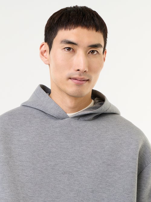 Sweat à capuche avec poche kangourou - Kiabi Sweat à capuche avec poche kangourou - Kiabi