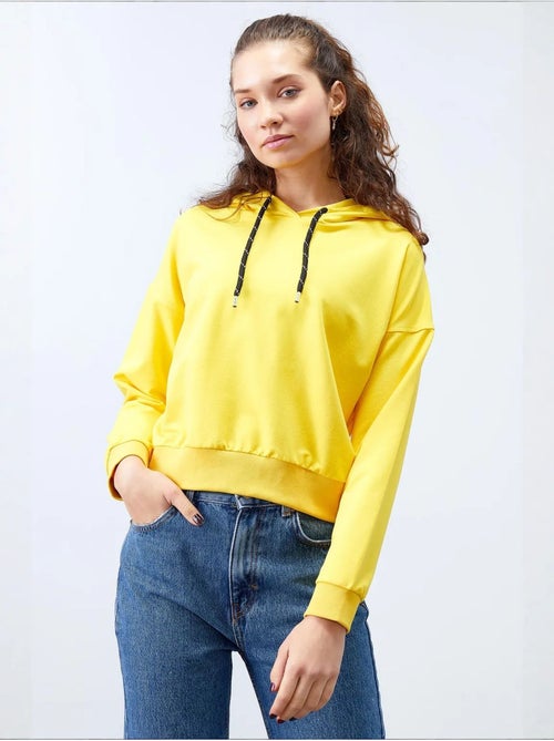 Sweat à capuche coupe décontractée avec lien tommy - Kiabi Sweat à capuche coupe décontractée avec lien tommy - Kiabi