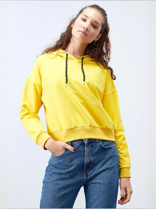 Sweat à capuche coupe décontractée avec lien tommy - Kiabi Sweat à capuche coupe décontractée avec lien tommy - Kiabi