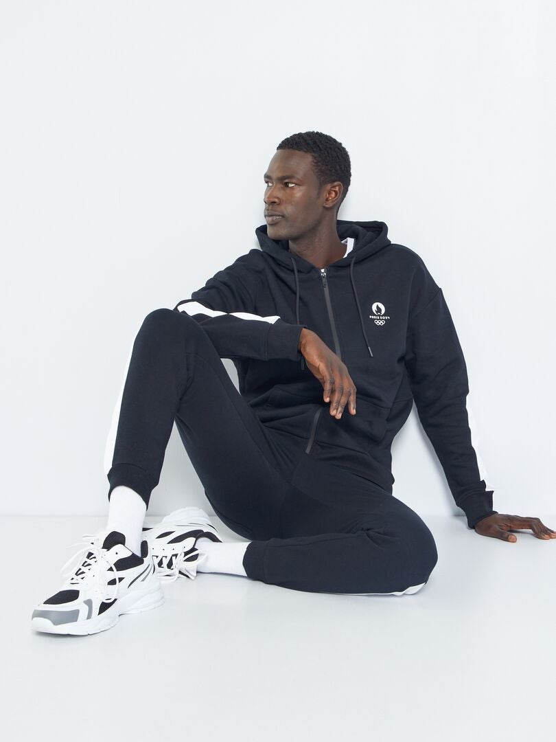 Sweat à capuche en molleton Paris 2024 noir Kiabi 25.00€