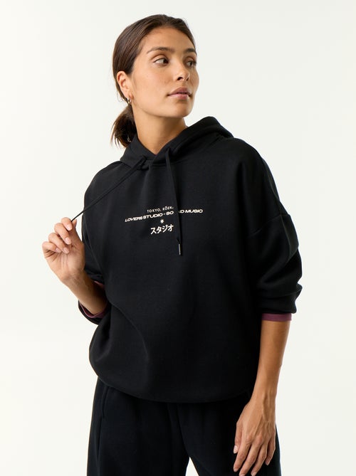 Sweat à capuche imprimé recto-verso - Kiabi Sweat à capuche imprimé recto-verso - Kiabi