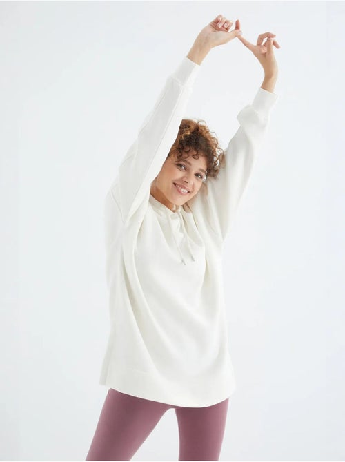 Sweat à capuche oversize avec poche tommy - Kiabi Sweat à capuche oversize avec poche tommy - Kiabi