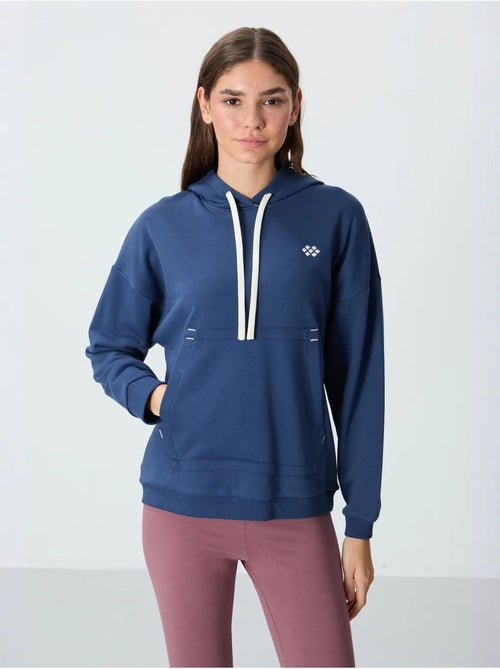 Sweat à capuche oversize avec poche tommy - Kiabi Sweat à capuche oversize avec poche tommy - Kiabi