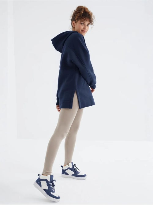 Sweat à capuche oversize avec poche tommy - Kiabi Sweat à capuche oversize avec poche tommy - Kiabi