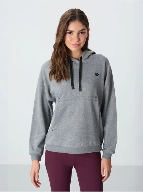 Sweat à capuche oversize avec poche tommy - Kiabi Sweat à capuche oversize avec poche tommy - Kiabi