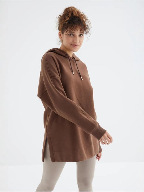 Sweat à capuche oversize avec poche tommy - Kiabi Sweat à capuche oversize avec poche tommy - Kiabi