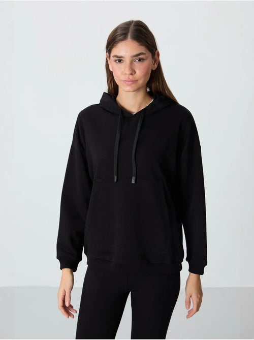 Sweat à capuche oversize avec poche tommy - Kiabi Sweat à capuche oversize avec poche tommy - Kiabi