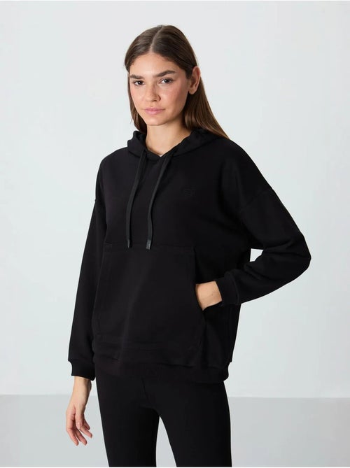 Sweat à capuche oversize avec poche tommy - Kiabi Sweat à capuche oversize avec poche tommy - Kiabi