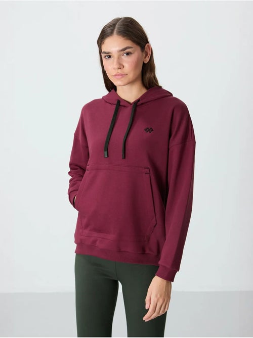 Sweat à capuche oversize avec poche tommy - Kiabi Sweat à capuche oversize avec poche tommy - Kiabi