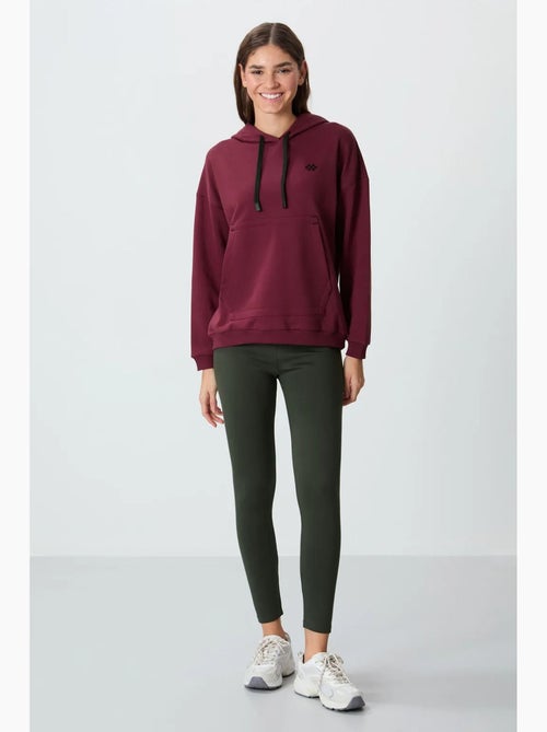 Sweat à capuche oversize avec poche tommy - Kiabi Sweat à capuche oversize avec poche tommy - Kiabi