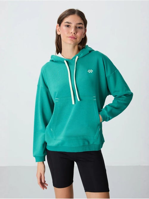 Sweat à capuche oversize avec poche tommy - Kiabi Sweat à capuche oversize avec poche tommy - Kiabi