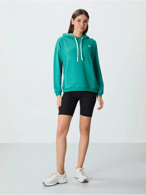 Sweat à capuche oversize avec poche tommy - Kiabi Sweat à capuche oversize avec poche tommy - Kiabi