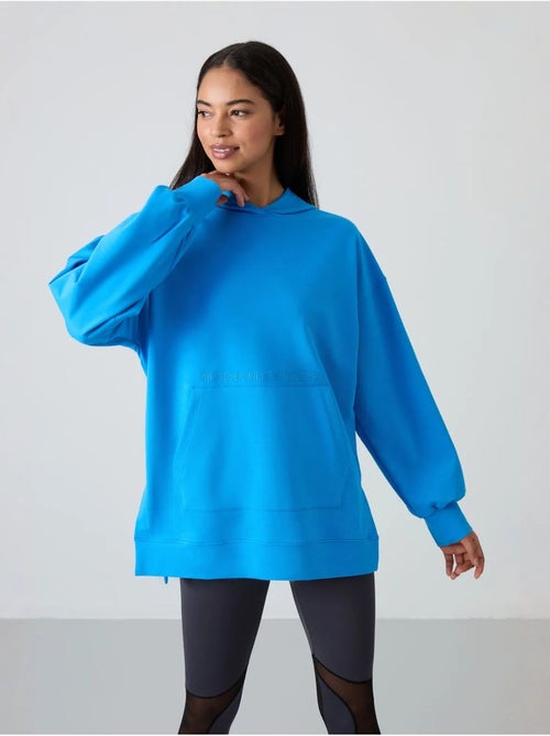 Sweat à capuche oversize imprimé tommy - Kiabi Sweat à capuche oversize imprimé tommy - Kiabi