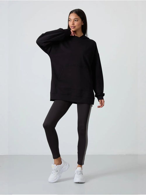 Sweat à capuche oversize imprimé tommy - Kiabi Sweat à capuche oversize imprimé tommy - Kiabi