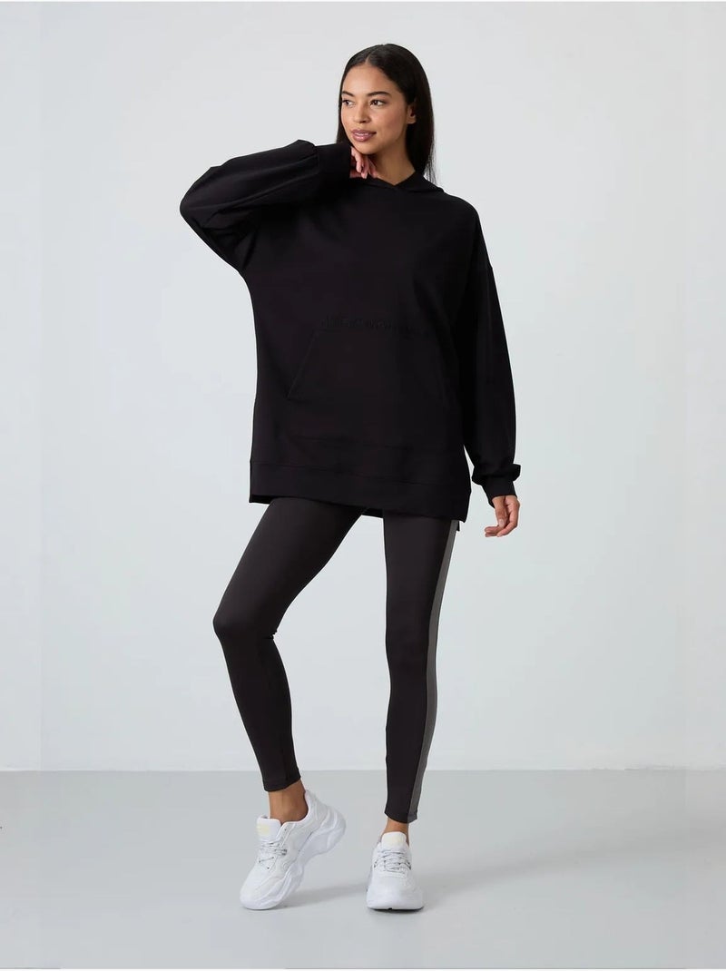 Sweat à capuche oversize imprimé tommy Noir - Kiabi