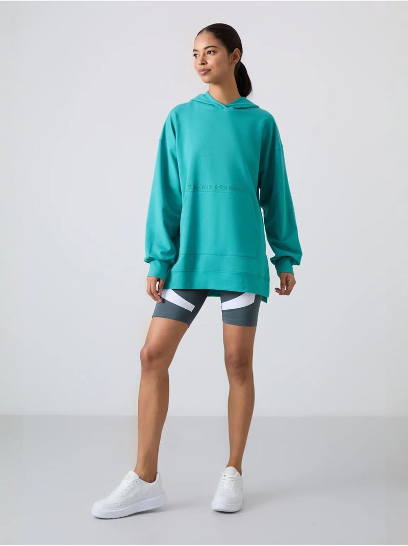 Sweat à capuche oversize imprimé tommy Vert menthe - Kiabi