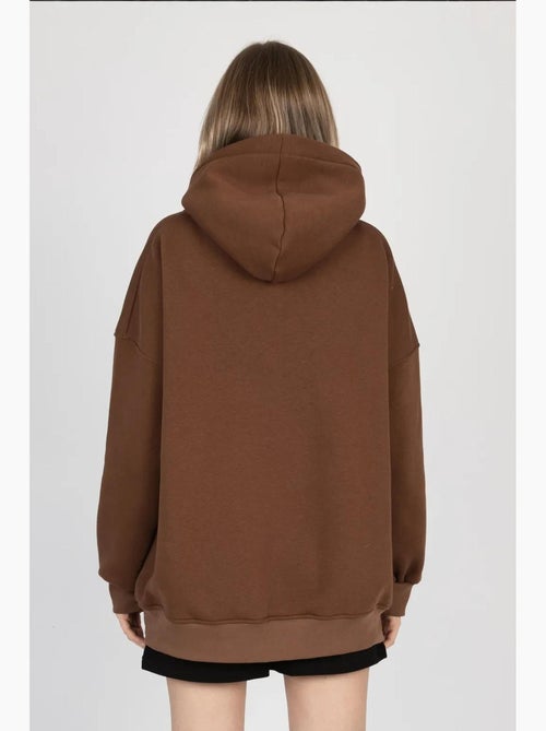 Sweat à capuche surdimensionné avec poche kangourou hiccup - Kiabi Sweat à capuche surdimensionné avec poche kangourou hiccup - Kiabi