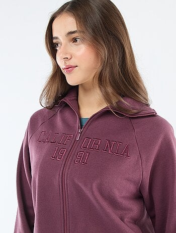 Sweat court zippé à message brodé
