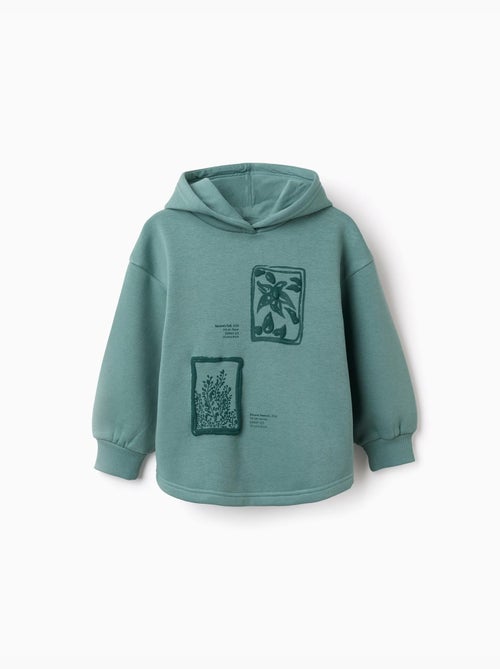 Sweat en coton peigné à capuche et imprimé floral - Kiabi Sweat en coton peigné à capuche et imprimé floral - Kiabi
