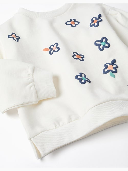 Sweat en coton peigné avec fleurs en relief - Kiabi Sweat en coton peigné avec fleurs en relief - Kiabi