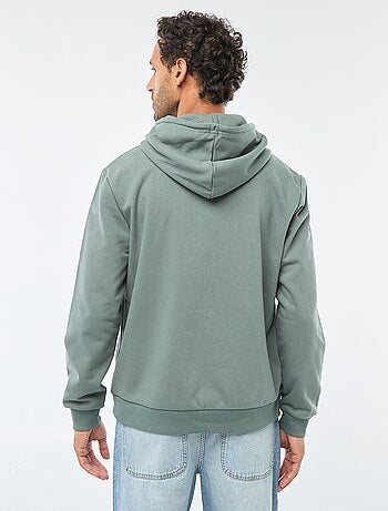 Sweat en molleton à capuche avec ouverture zippée au col