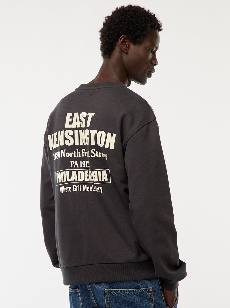 Sweat en molleton à col rond avec un imprimé recto-verso Noir - Kiabi