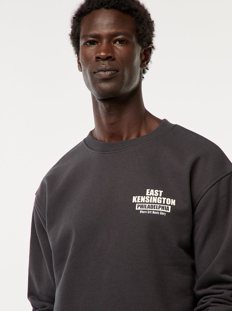 Sweat en molleton à col rond avec un imprimé recto-verso Noir - Kiabi