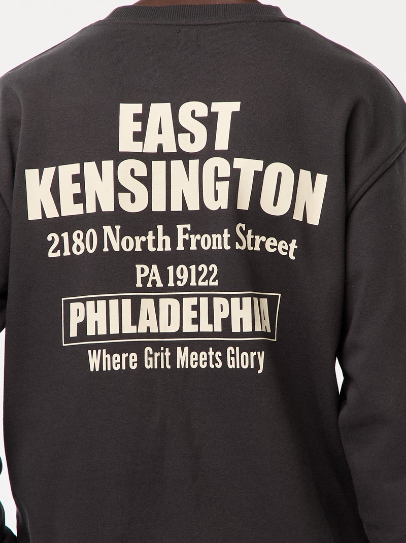 Sweat en molleton à col rond avec un imprimé recto-verso Noir - Kiabi