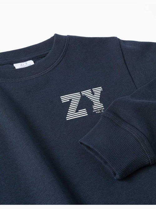 Sweat en molleton avec imprimé zy en relief - Kiabi Sweat en molleton avec imprimé zy en relief - Kiabi