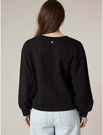 Sweat femme en coton doux deeluxe x COCA-Cola
'Deeluxe'