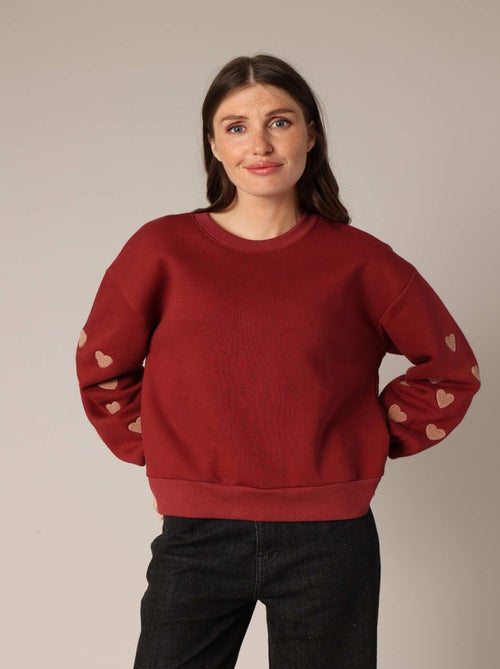 Sweat orné de petits cœurs en relief 'Deeluxe' - Kiabi