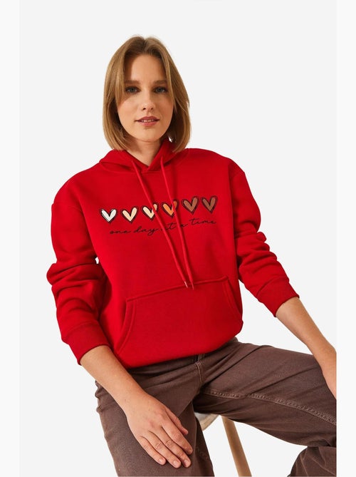 Sweat-shirt à capuche à triple fil brossé et imprimé cœur lucci - Kiabi Sweat-shirt à capuche à triple fil brossé et imprimé cœur lucci - Kiabi