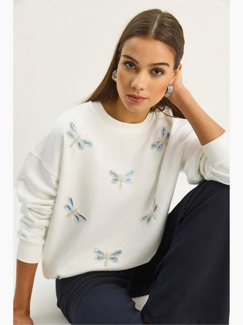 Sweat-shirt à col rond brodé de libellule lucci - Kiabi