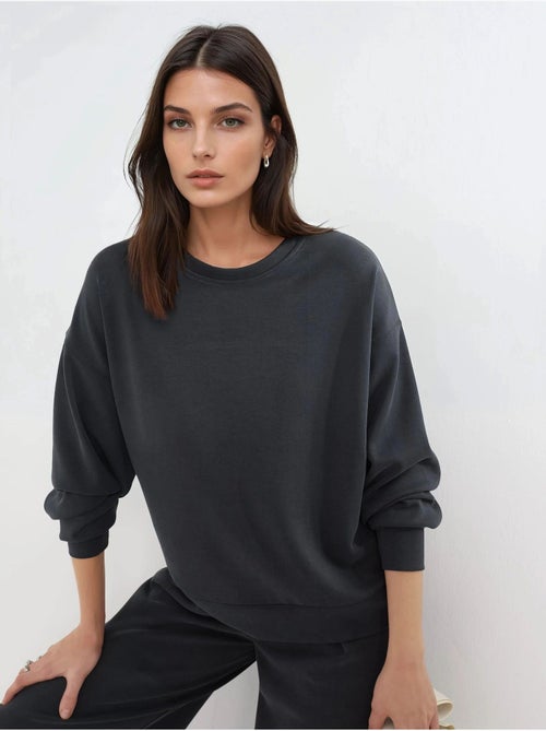 Sweat-shirt à col rond coupe décontractée busem - Kiabi Sweat-shirt à col rond coupe décontractée busem - Kiabi