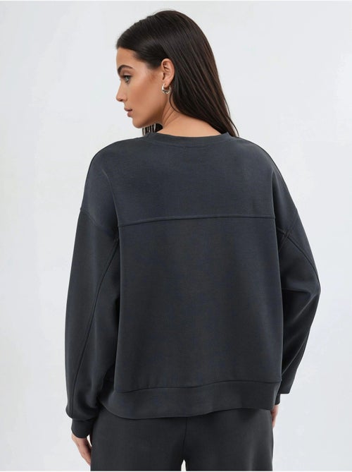 Sweat-shirt à col rond coupe décontractée busem - Kiabi Sweat-shirt à col rond coupe décontractée busem - Kiabi